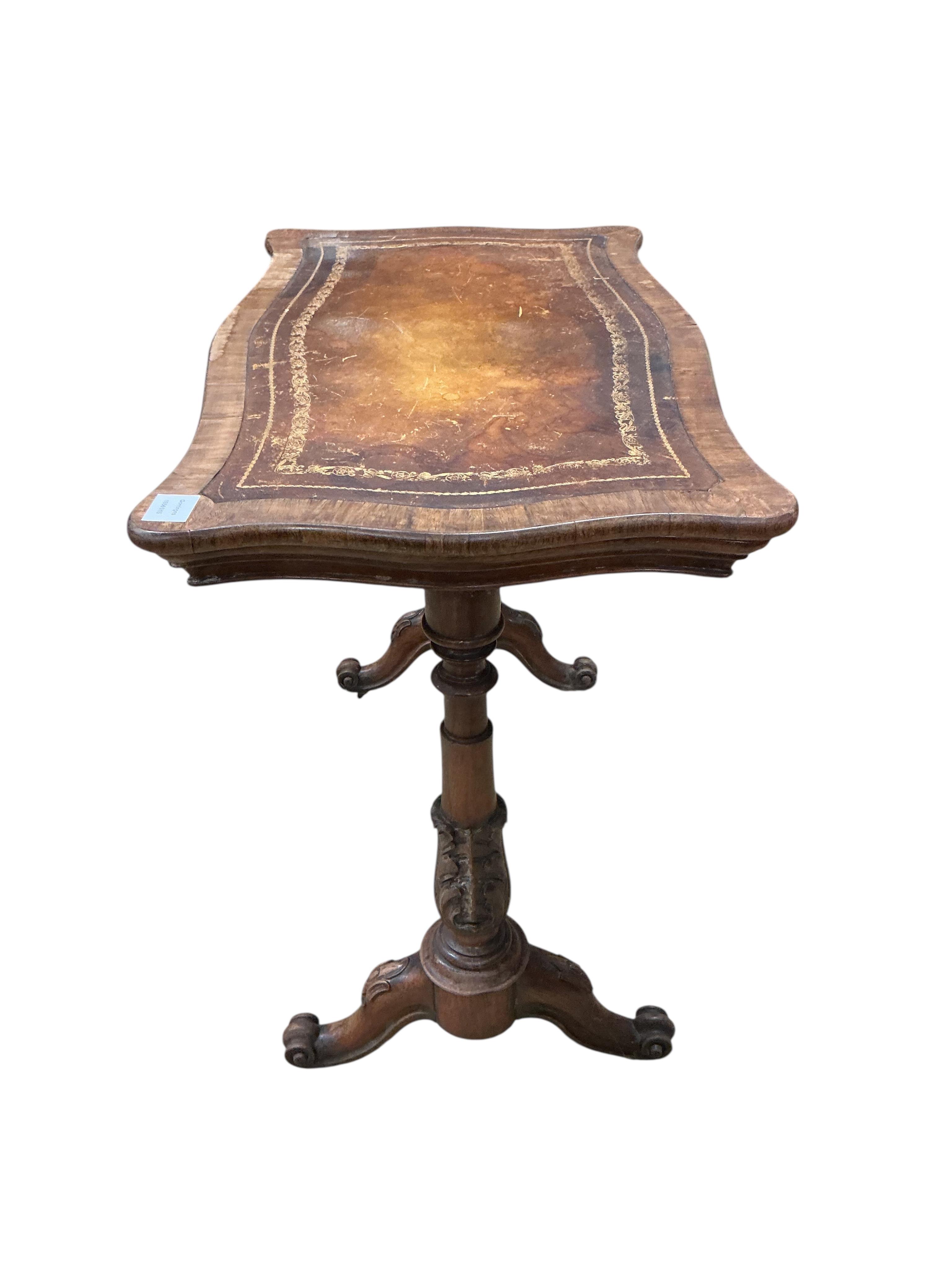 An early Victorian rosewood serpentine folding writing, jardiniere table, width 80cm, depth 49cm, height 71cm